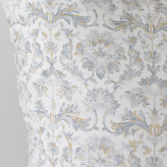 Cream linen fabric with blue and gold floral damask pattern.