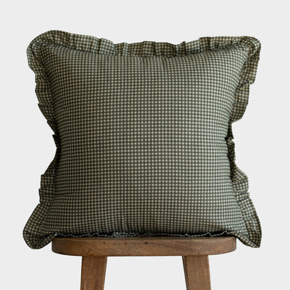 Green and white mini gingham pillow with ruffled edges on all sides.