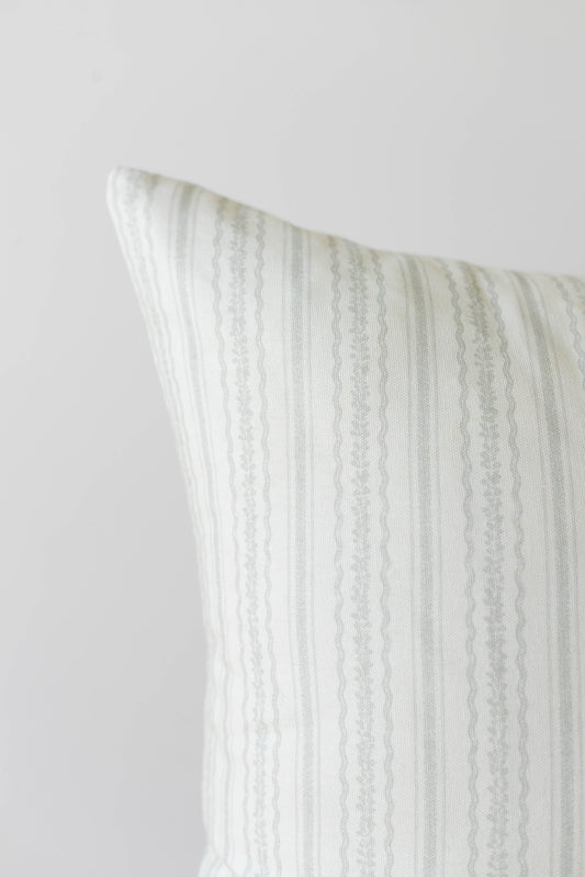 Cream and beige striped pillow cover with vertical woven texture pattern.