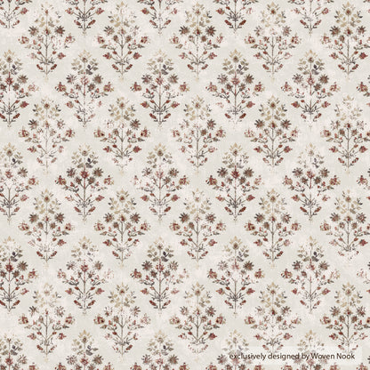 Cream-colored fabric with repeating symmetrical botanical motifs in burgundy, tan, and sage green tones.