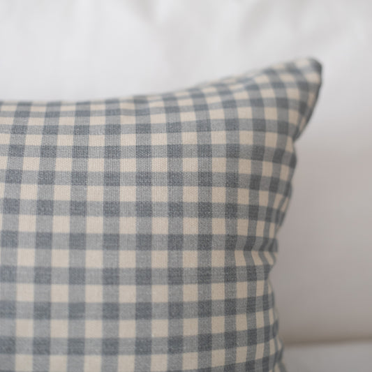 Dusty blue and cream gingham checkered pillow cover with woven texture.