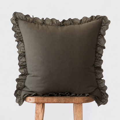 Dark olive square pillow with ruffled eyelet lace trim on all sides.