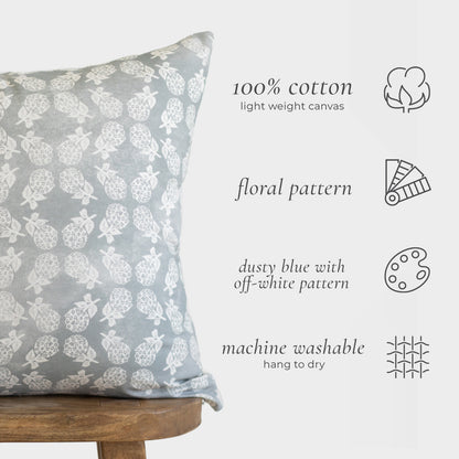 Dusty blue pillow with off-white floral pattern in 100% cotton canvas.