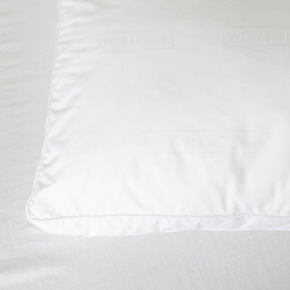 White faux down pillow insert with visible stitching and a smooth polyester cover.