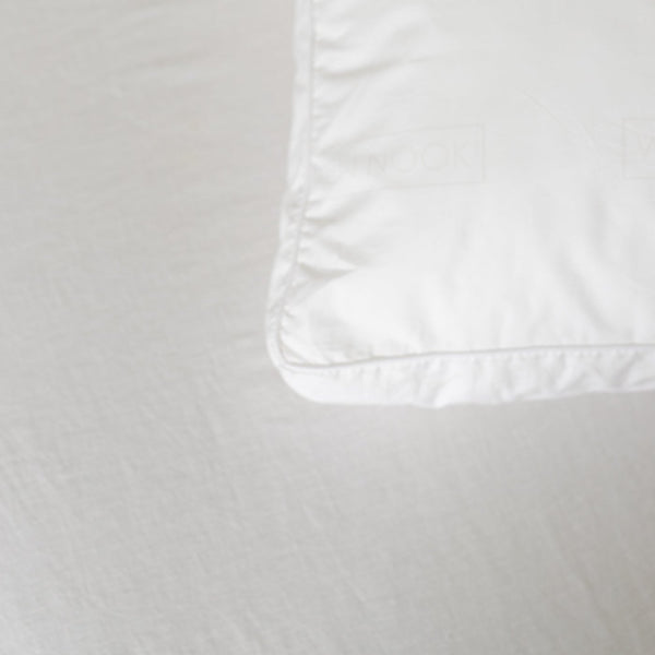 White faux down insert pillow sham with stitched edge detail.