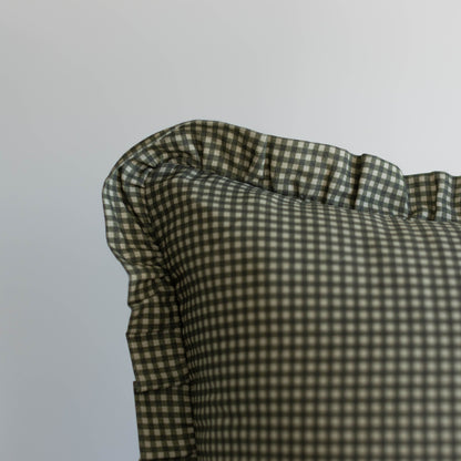 Green and white mini gingham ruffle with gathered fabric detail on light gray background.