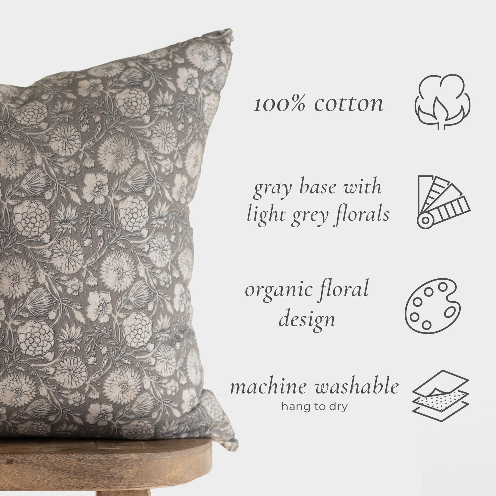 Gray lumbar pillow with light gray floral pattern in organic botanical design, 100% cotton.