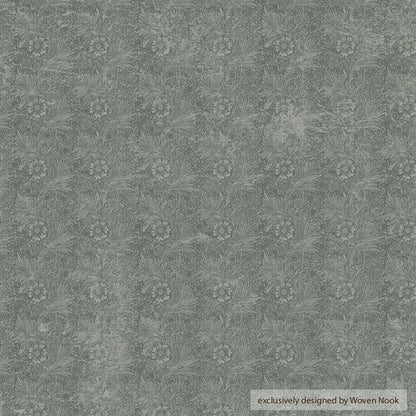 Gray lumbar pillow cover with repeating floral and leaf pattern throughout.