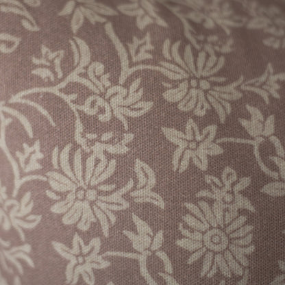 Taupe damask patterned fabric with cream floral motifs on textured woven material.