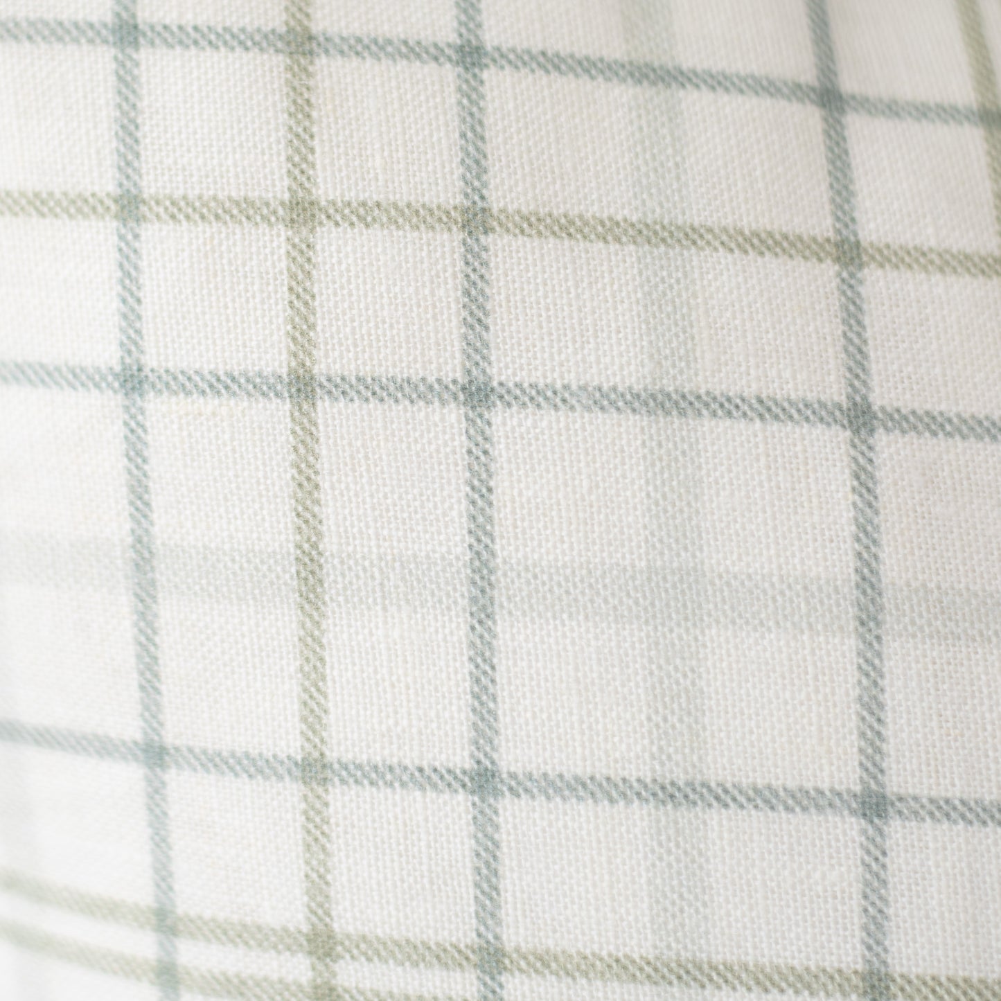 Cream linen with sage green and gray plaid pattern.