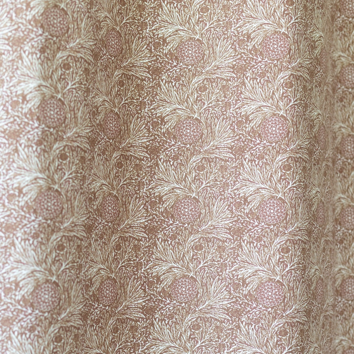 Beige curtain panel with botanical print featuring pineapples and feathered leaves in a repeating pattern.