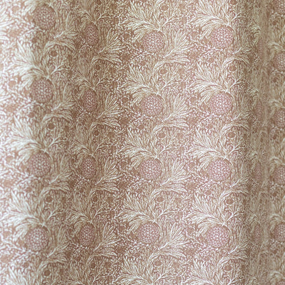 Beige curtain panel with botanical print featuring pineapples and feathered leaves in a repeating pattern.