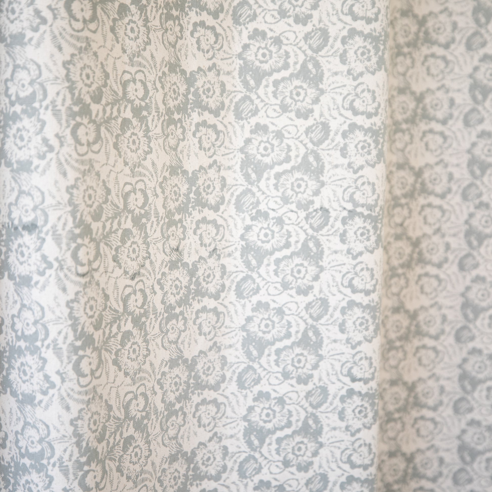 Two sheer curtain panels with gray and white damask floral pattern, 52" x 96".
