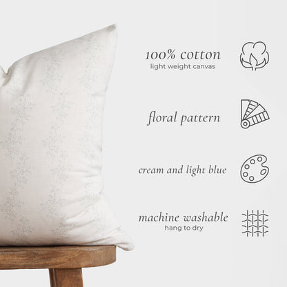 Cream and light blue pillow with delicate floral pattern in 100% cotton canvas.