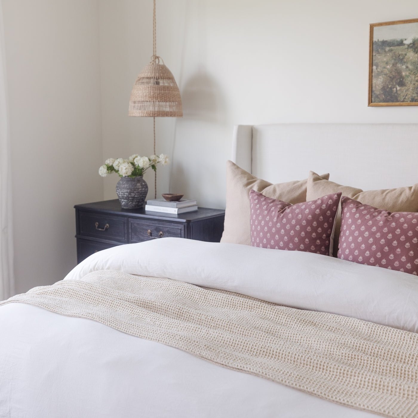 White king duvet cover set on bed with textured neutral bedding and decorative pillows.