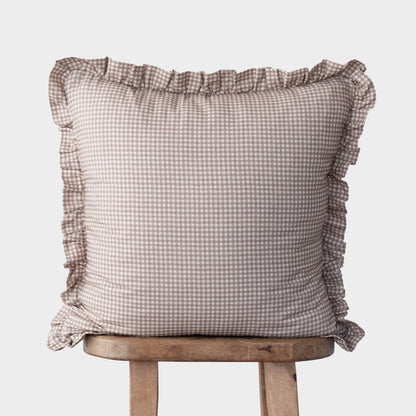 Tan and white mini gingham pillow cover with ruffled edges on all sides.