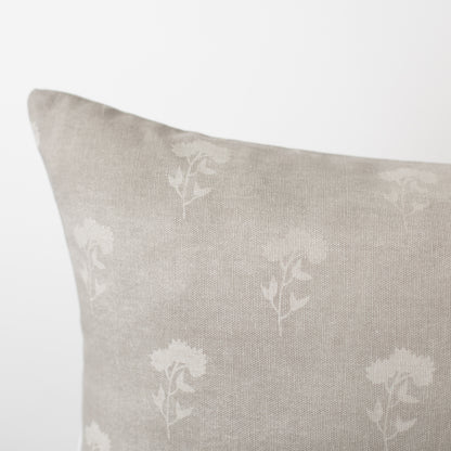 Gray lumbar pillow with subtle white floral pattern throughout.