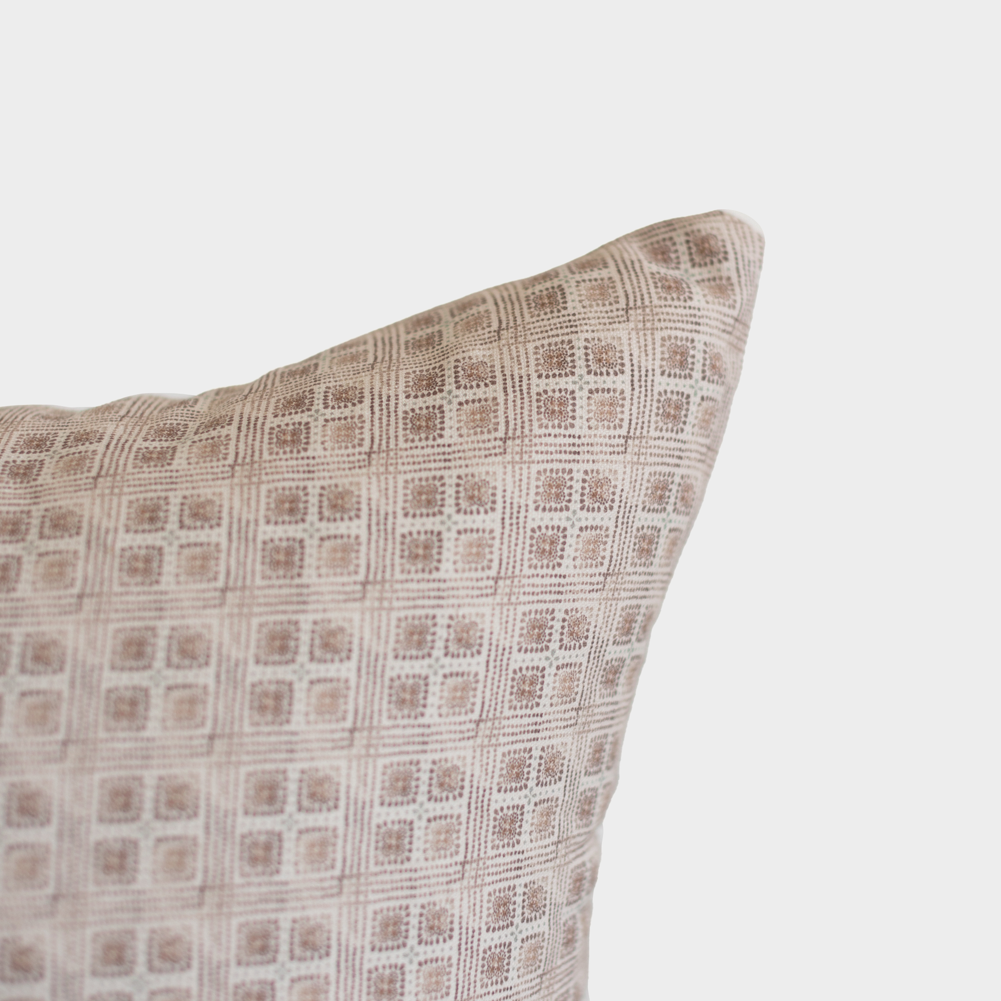 Brown and cream grid patterned Euro pillow with geometric floral motif design.