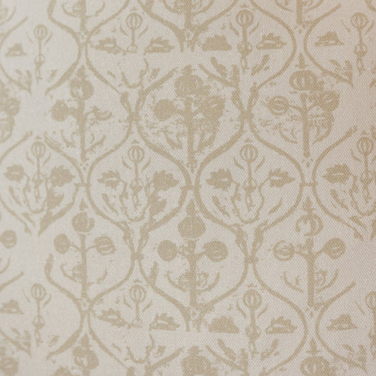 Cream and beige fabric with repeating hourglass and floral damask pattern throughout.