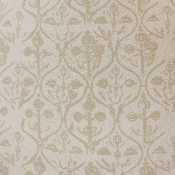 Cream and beige fabric with repeating hourglass and floral damask pattern throughout.